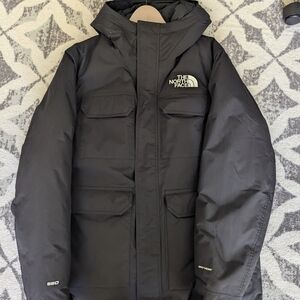 Men's medium down filled North face jacket